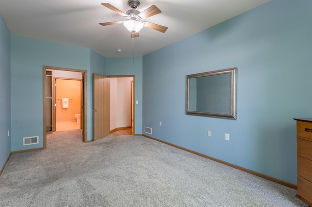 2230 Lower Afton Rd E, Saint Paul, MN 55119 - unfurnished bedroom featuring carpet floors, baseboards, ensuite bath, and ceiling fan