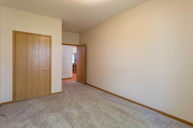 2230 Lower Afton Rd E, Saint Paul, MN 55119 - unfurnished bedroom with carpet flooring and baseboards