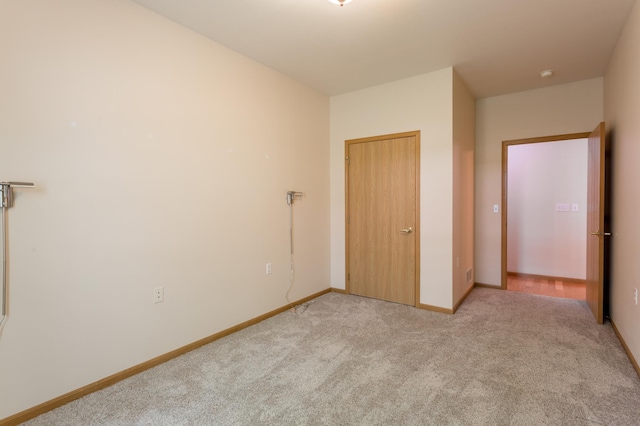 2230 Lower Afton Rd E, Saint Paul, MN 55119 - unfurnished bedroom with light carpet and baseboards