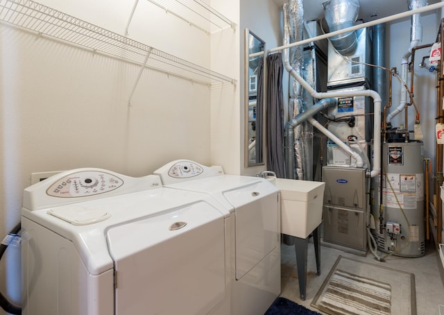 2230 Lower Afton Rd E, Saint Paul, MN 55119 - laundry area with water heater and separate washer and dryer