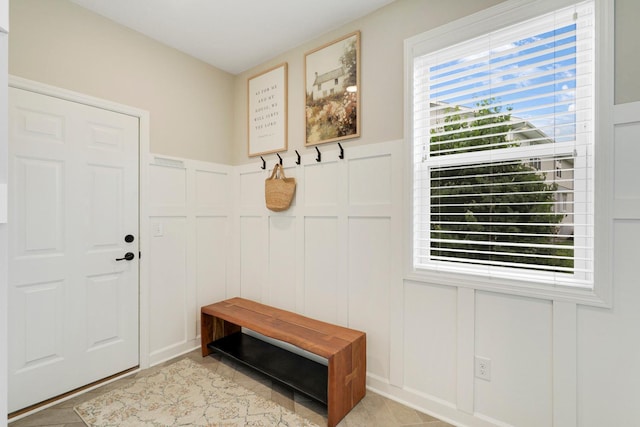 8633 Ambergate Dr, Victoria, MN 55386 - mudroom with a decorative wall and wainscoting