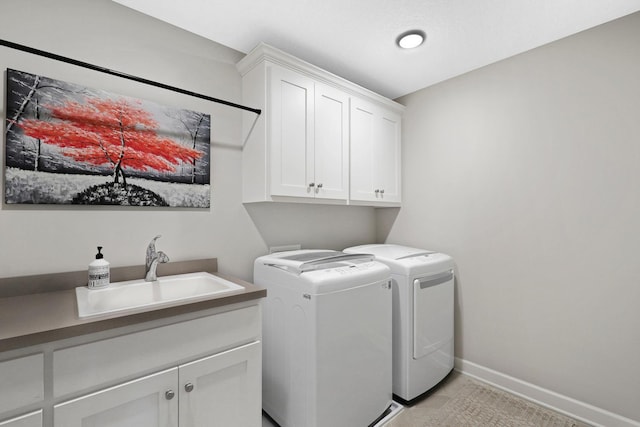 8633 Ambergate Dr, Victoria, MN 55386 - laundry room with cabinet space, washer and clothes dryer, and light tile patterned floors