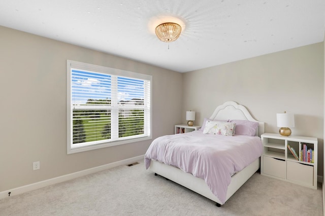 8633 Ambergate Dr, Victoria, MN 55386 - bedroom featuring light carpet