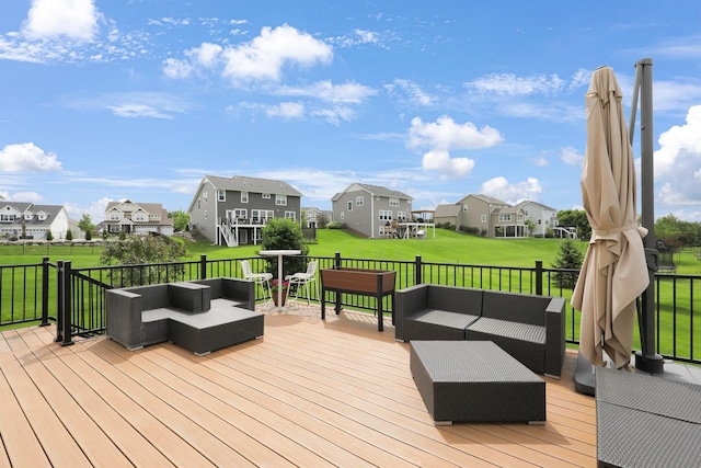 8633 Ambergate Dr, Victoria, MN 55386 - wooden terrace with an outdoor living space, a residential view, and a lawn