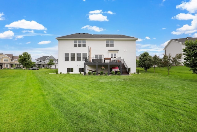 8633 Ambergate Dr, Victoria, MN 55386 - rear view of house featuring stairway, a wooden deck, and a lawn