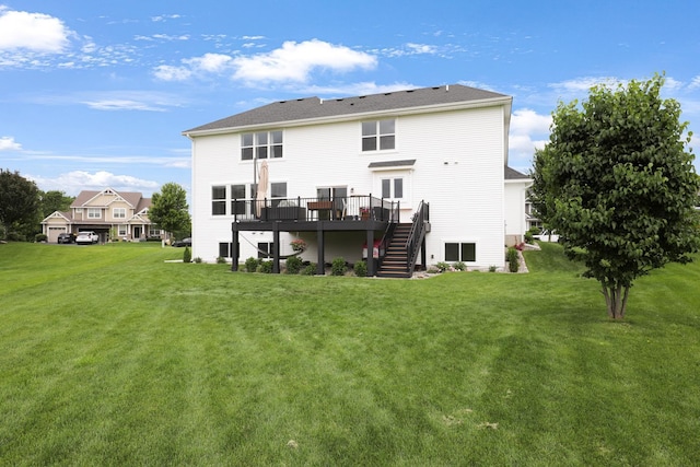 8633 Ambergate Dr, Victoria, MN 55386 - rear view of property with stairs, a wooden deck, and a lawn