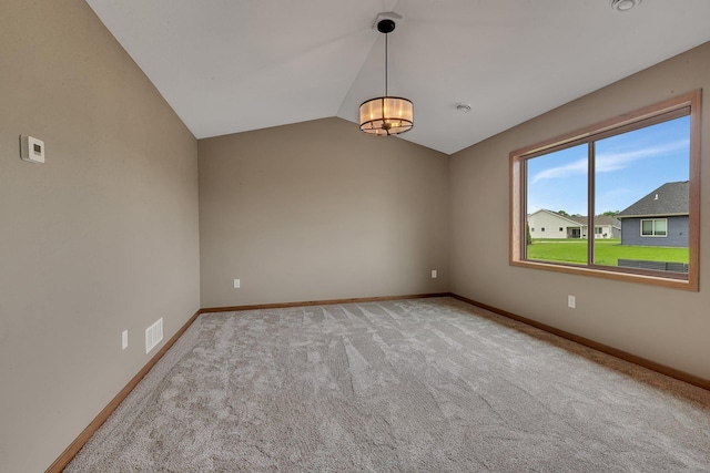 212 Woolgrass Way, Avon, MN 56310 - carpeted empty room featuring lofted ceiling, baseboards, and a chandelier