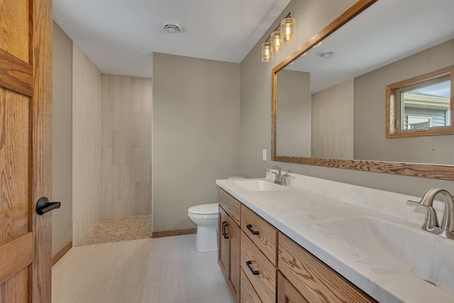 212 Woolgrass Way, Avon, MN 56310 - bathroom featuring double vanity, toilet, and a walk in shower