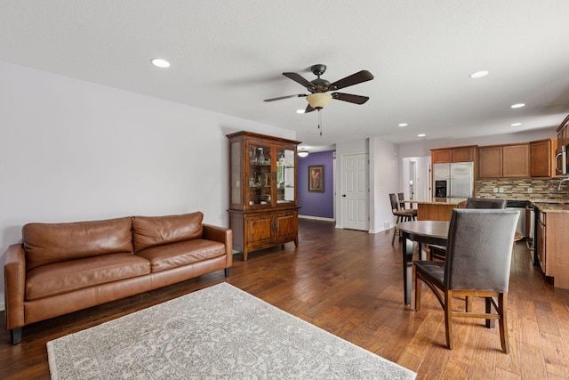 5110 Woodridge Rd, Minnetonka, MN 55345 - living area featuring ceiling fan, dark wood-type flooring, recessed lighting, and baseboards