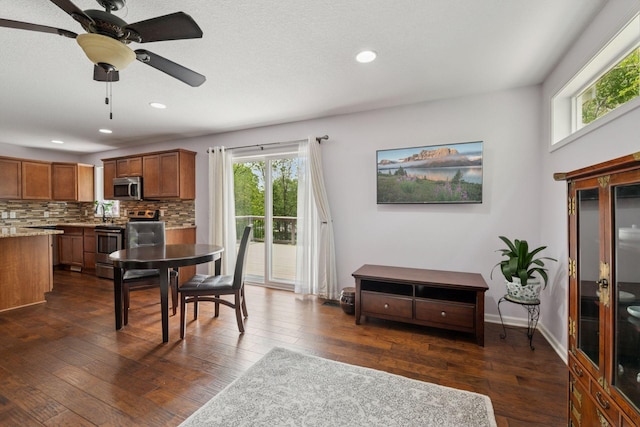 5110 Woodridge Rd, Minnetonka, MN 55345 - dining room with recessed lighting, ceiling fan, dark wood-type flooring, and baseboards