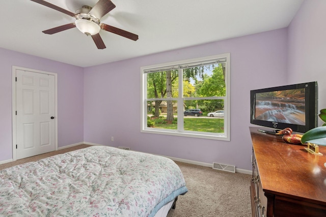 5110 Woodridge Rd, Minnetonka, MN 55345 - bedroom with light colored carpet, baseboards, and a ceiling fan