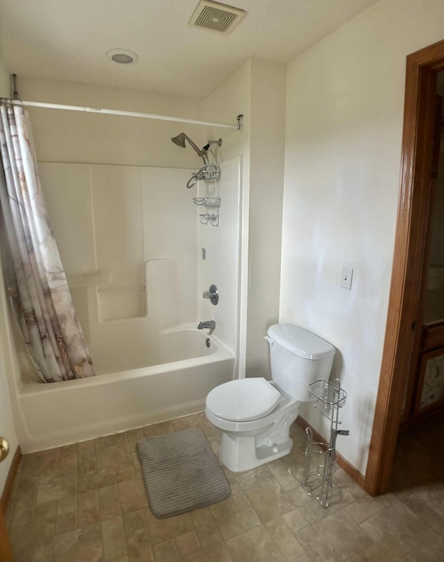 1366 Phalen Blvd, Saint Paul, MN 55106 - bathroom with shower / tub combo, toilet, and baseboards