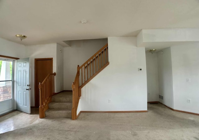 1366 Phalen Blvd, Saint Paul, MN 55106 - staircase with carpet and baseboards