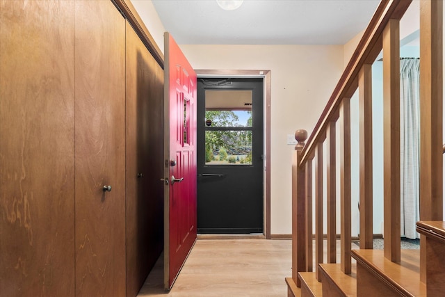 41502 Flink Ave, North Branch, MN 55056 - doorway with light wood-type flooring and stairs