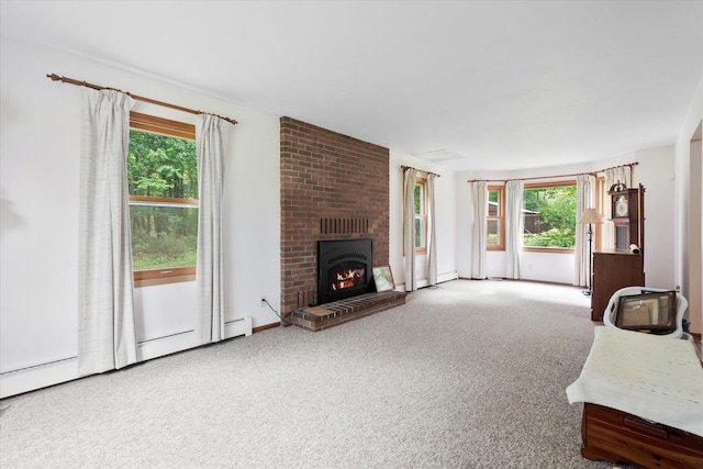 41502 Flink Ave, North Branch, MN 55056 - unfurnished living room featuring healthy amount of natural light, a fireplace, and carpet flooring