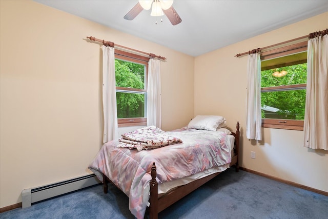 41502 Flink Ave, North Branch, MN 55056 - carpeted bedroom with a baseboard radiator and a ceiling fan