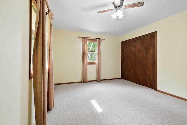 41502 Flink Ave, North Branch, MN 55056 - unfurnished bedroom featuring carpet, ceiling fan, and a closet