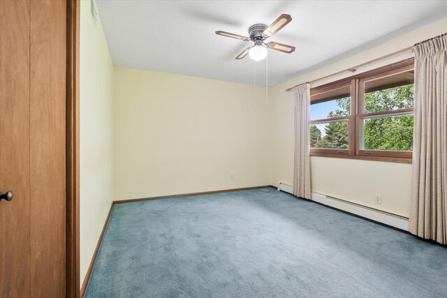 41502 Flink Ave, North Branch, MN 55056 - carpeted empty room with a baseboard radiator and ceiling fan