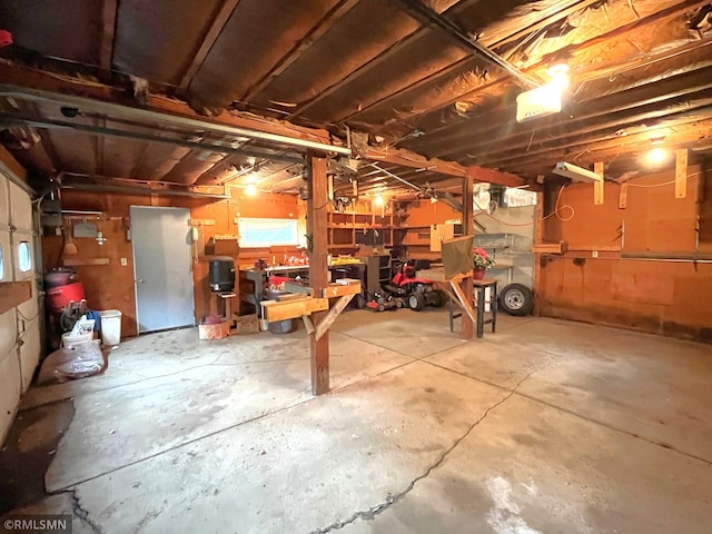 1277 Shakopee Ave E, Shakopee, MN 55379 - below grade area with a workshop area and a garage