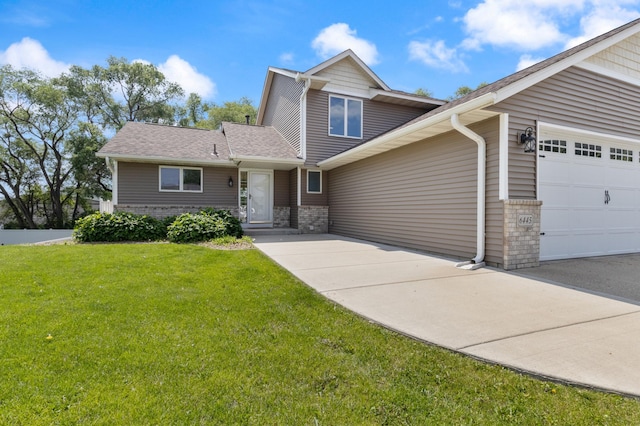 6445 Coryell Ct, Inver Grove Heights, MN 55076 - view of front of home with a garage, a front lawn, and brick siding