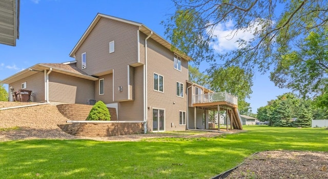 6445 Coryell Ct, Inver Grove Heights, MN 55076 - back of property featuring a deck and a yard