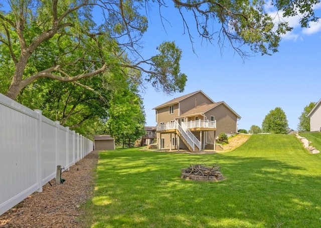 6445 Coryell Ct, Inver Grove Heights, MN 55076 - rear view of house with stairs, a deck, and an outdoor fire pit