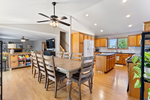 6445 Coryell Ct, Inver Grove Heights, MN 55076 - dining area with ceiling fan, light wood-type flooring, recessed lighting, lofted ceiling, and stairs