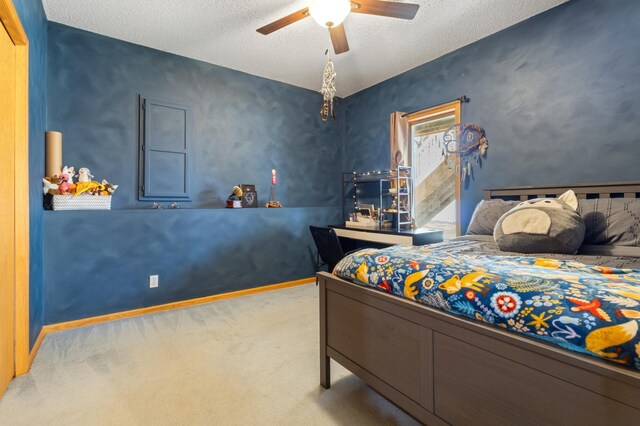 6445 Coryell Ct, Inver Grove Heights, MN 55076 - bedroom featuring carpet, a textured ceiling, a ceiling fan, and baseboards