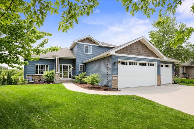 231 Winkler Trl, Cologne, MN 55322 - craftsman-style house featuring stone siding, an attached garage, concrete driveway, and a front lawn