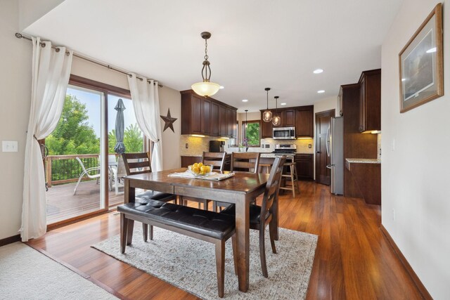 231 Winkler Trl, Cologne, MN 55322 - dining area featuring dark wood finished floors, baseboards, and recessed lighting