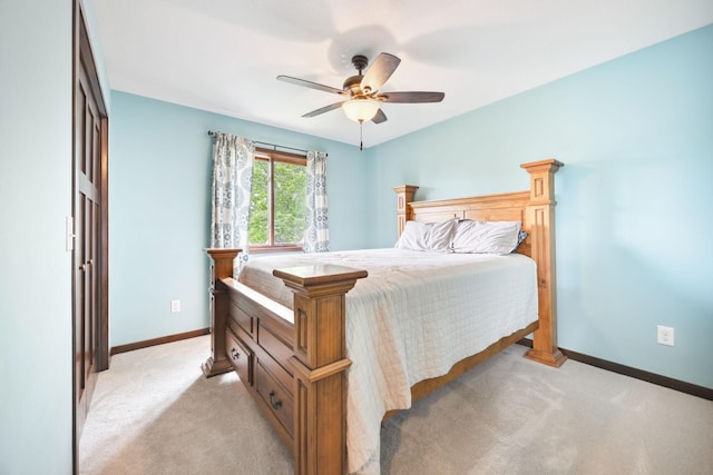 231 Winkler Trl, Cologne, MN 55322 - bedroom with light carpet, baseboards, and ceiling fan