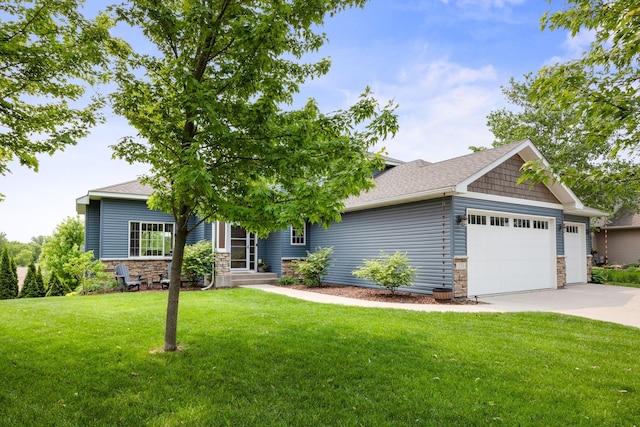 231 Winkler Trl, Cologne, MN 55322 - view of front of property featuring stone siding, a garage, concrete driveway, a front lawn, and a shingled roof