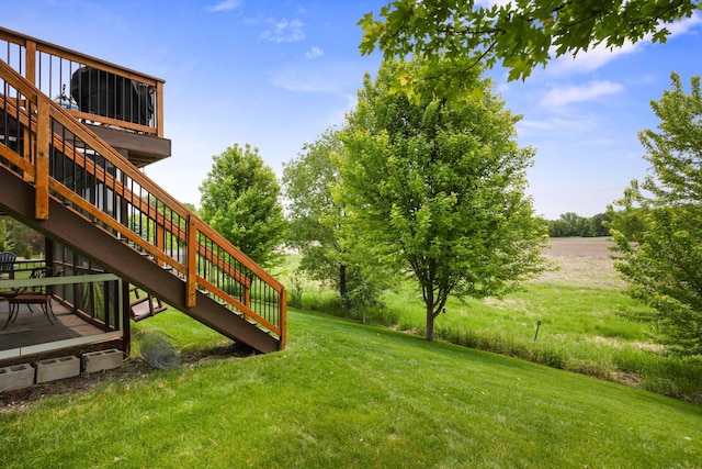 231 Winkler Trl, Cologne, MN 55322 - view of green lawn with stairs and a wooden deck