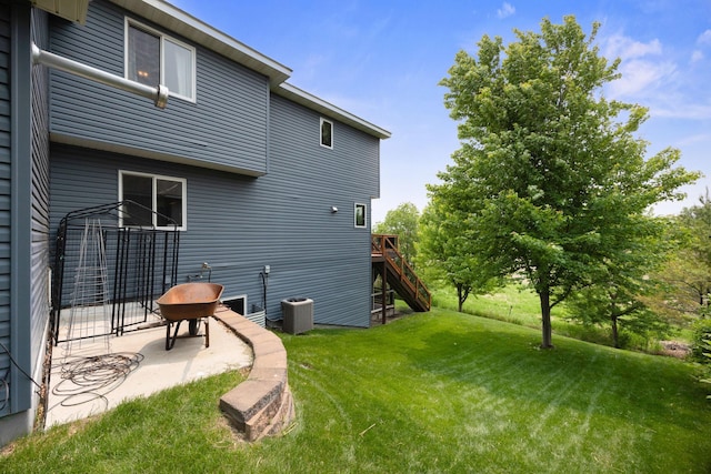 231 Winkler Trl, Cologne, MN 55322 - view of green lawn with stairs and a wooden deck