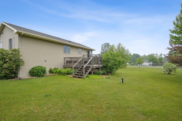 881 217th St, Osceola, WI 54020 - view of green lawn with a deck and stairs