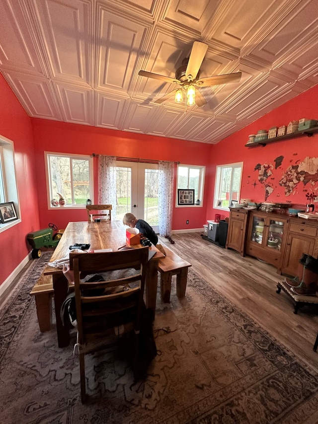 12283 County Road 31, Mount Vernon Twp, MN 55910 - dining space featuring french doors, an ornate ceiling, wood finished floors, ceiling fan, and lofted ceiling