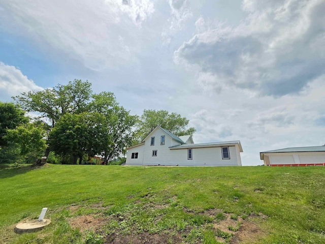 12283 County Road 31, Mount Vernon Twp, MN 55910 - back of house featuring a yard
