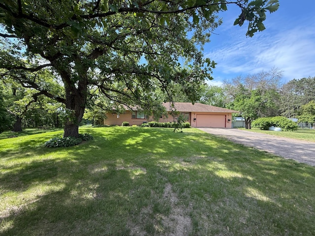 26813 Scenic Byway Rd, Faxon Twp, MN 56011 - view of front of house with asphalt driveway, a garage, and a front yard