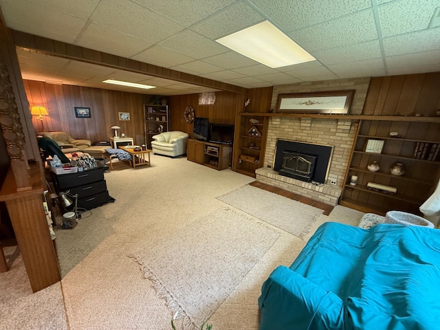 26813 Scenic Byway Rd, Faxon Twp, MN 56011 - carpeted living area with wood walls and a paneled ceiling