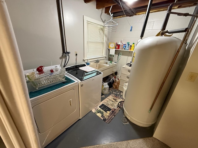 26813 Scenic Byway Rd, Faxon Twp, MN 56011 - laundry room featuring washing machine and clothes dryer, water heater, and concrete block wall