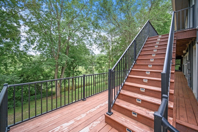 6230 Elm Ridge Cir, Corcoran, MN 55340 - wooden deck with stairs and view of scattered trees