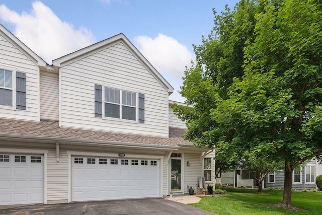 1924 Shamrock Pl, Chaska, MN 55318 - multi unit property featuring a garage, driveway, a shingled roof, and a front yard