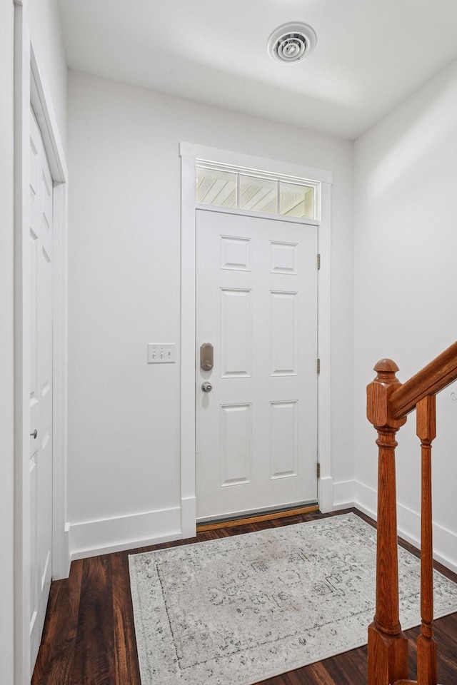 1924 Shamrock Pl, Chaska, MN 55318 - foyer entrance featuring dark wood-style flooring and baseboards