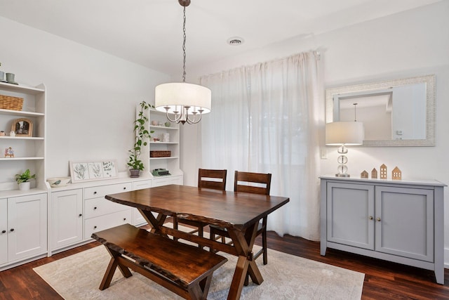1924 Shamrock Pl, Chaska, MN 55318 - dining space with dark wood-type flooring and a chandelier
