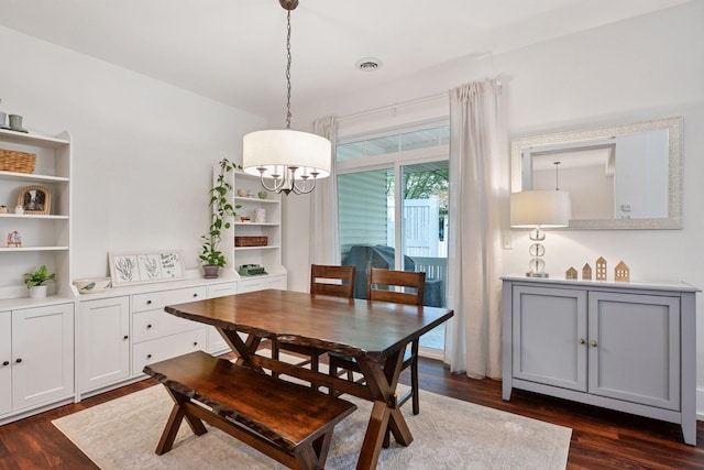 1924 Shamrock Pl, Chaska, MN 55318 - dining space with dark wood-type flooring and a chandelier