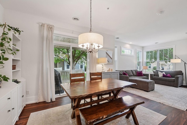 1924 Shamrock Pl, Chaska, MN 55318 - dining room featuring a chandelier and dark wood-style flooring