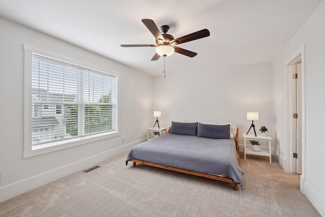 1924 Shamrock Pl, Chaska, MN 55318 - carpeted bedroom with baseboards and ceiling fan