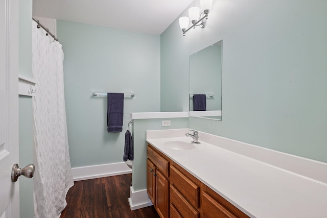 1924 Shamrock Pl, Chaska, MN 55318 - full bathroom with vanity, wood finished floors, and a shower with shower curtain