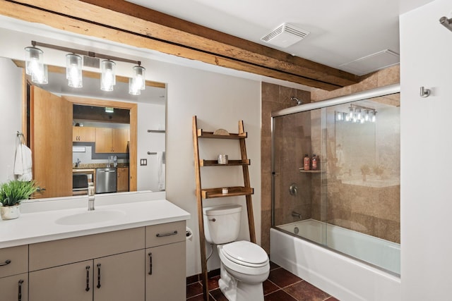 404 Washington Ave N Unit 504, Minneapolis, MN 55401 - full bathroom featuring vanity, toilet, shower / bath combination with glass door, and tile patterned flooring