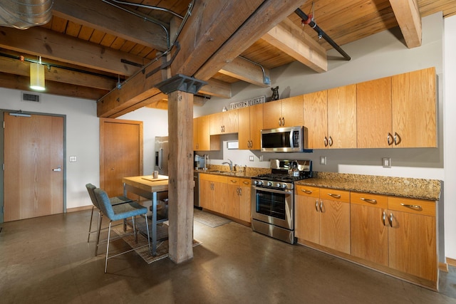 404 Washington Ave N Unit 504, Minneapolis, MN 55401 - kitchen featuring stainless steel appliances, wood ceiling with exposed beams, finished concrete floors, a sink, and light stone countertops